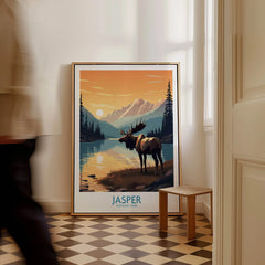 Framed Jasper National Park print with moose and mountains, leaning on floor in bright hallway