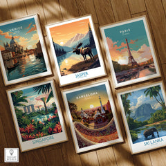 Set of six framed travel posters featuring Venice, Paris, Jasper National Park, Singapore, Barcelona, and Sri Lanka, displayed on a wooden floor.