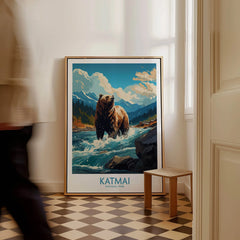 Framed Katmai National Park bear art print on floor, man walking past in modern home interior.