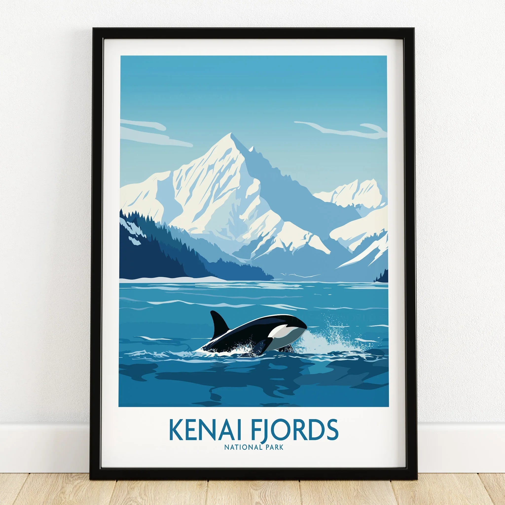 Kenai Fjords National Park art print with orca, snowy mountains, and blue ocean in black frame