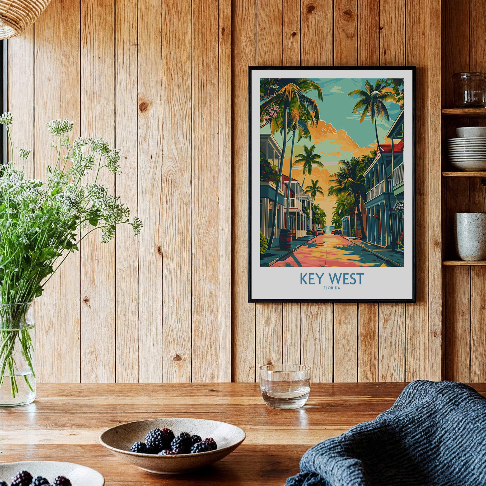 Key West Travel Poster - Florida displayed in a cozy interior with wooden accents and decorative plants.