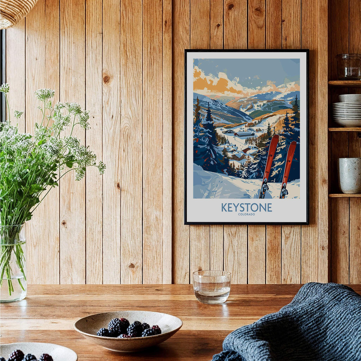 Keystone Wall Art Poster -  Colorado Ski Print framed in a cozy wooden interior with plants and table decor.