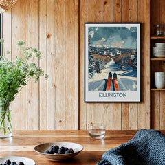 Killington Wall Art Poster displayed on a wooden wall with ski imagery, perfect for winter decor.