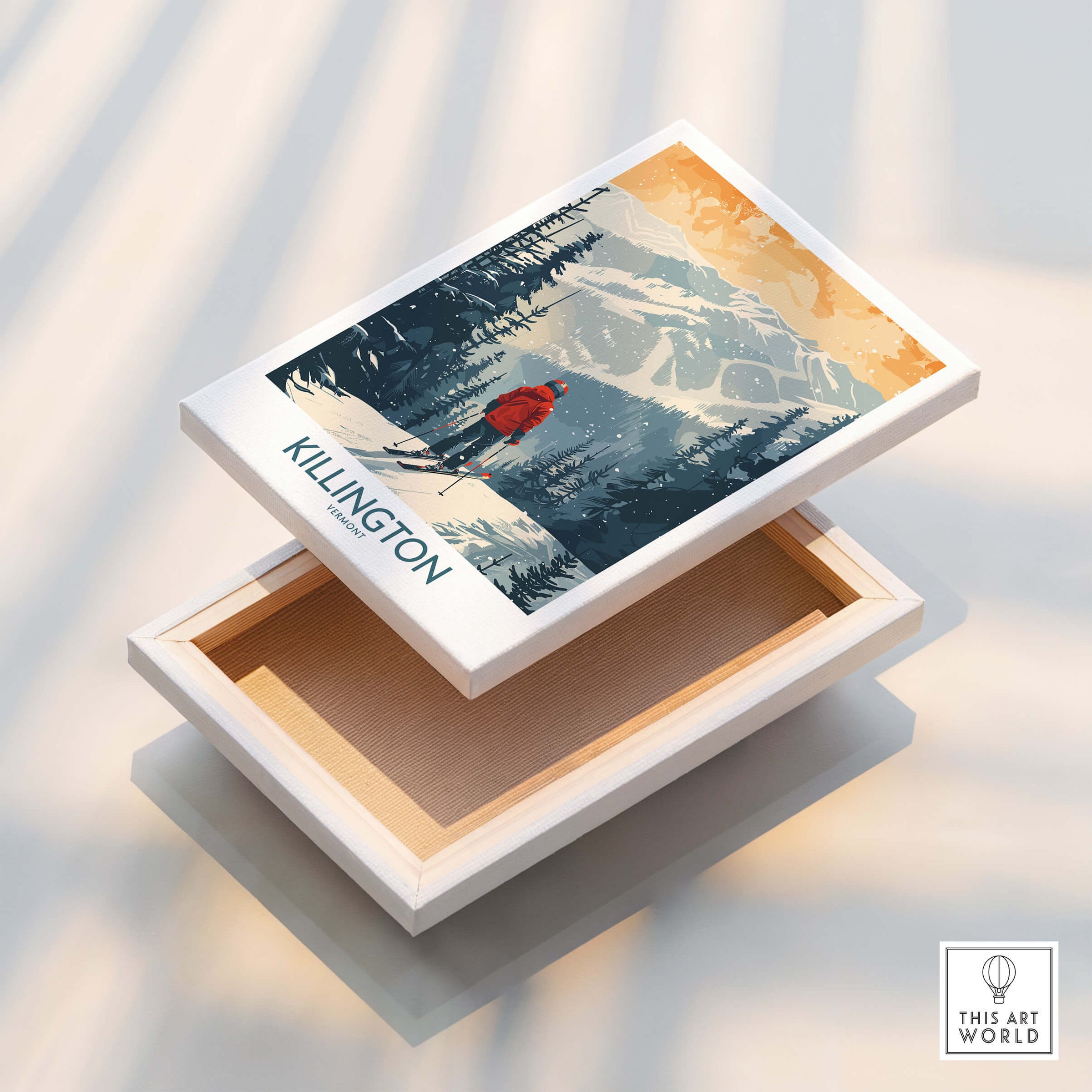 Killington Poster Vermont displayed on a decorative box, featuring snowy mountains and a skier in vibrant colors.