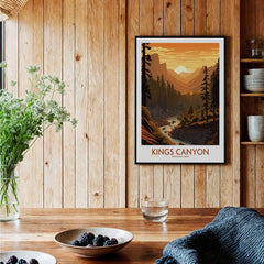 Kings Canyon National Park art print hanging in a modern rustic kitchen with wood panel walls.