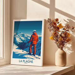 La Plagne Print featuring a skier overlooking the stunning French Alps and a vase with flowers.