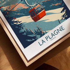 La Plagne Wall Art Ski Poster showcasing a vibrant ski resort scene with a cable car in the mountains.