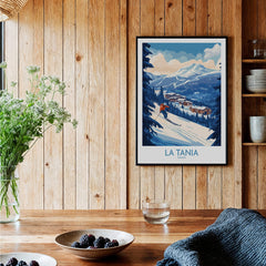 La Tania Ski Poster displayed in a cozy wooden interior, showcasing a scenic ski slope and mountain view.