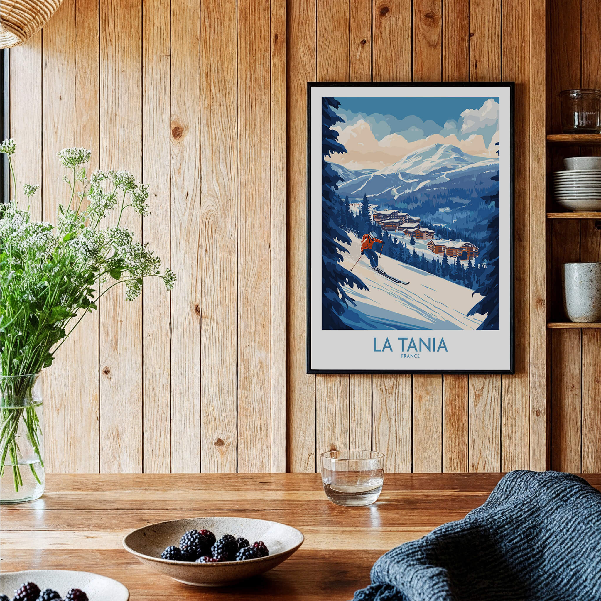 La Tania Ski Poster displayed in a cozy wooden interior, showcasing a scenic ski slope and mountain view.