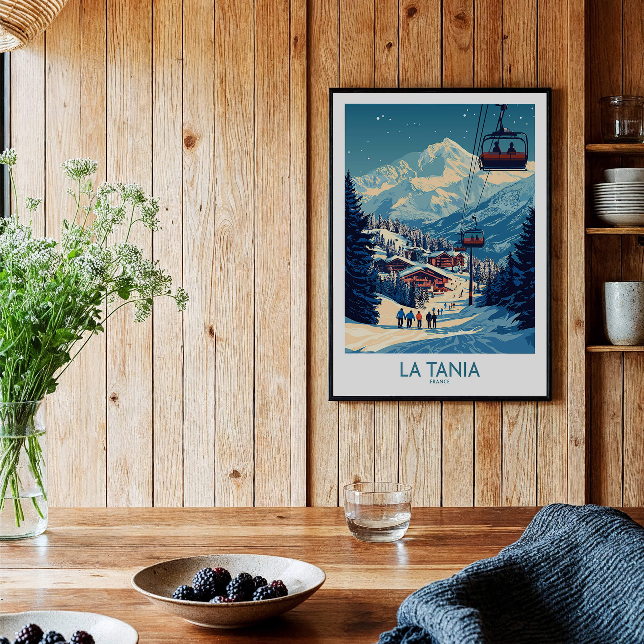 La Tania Wall Art Ski Poster featuring a ski resort scene with mountains, trees, and a ski lift in a cozy room.