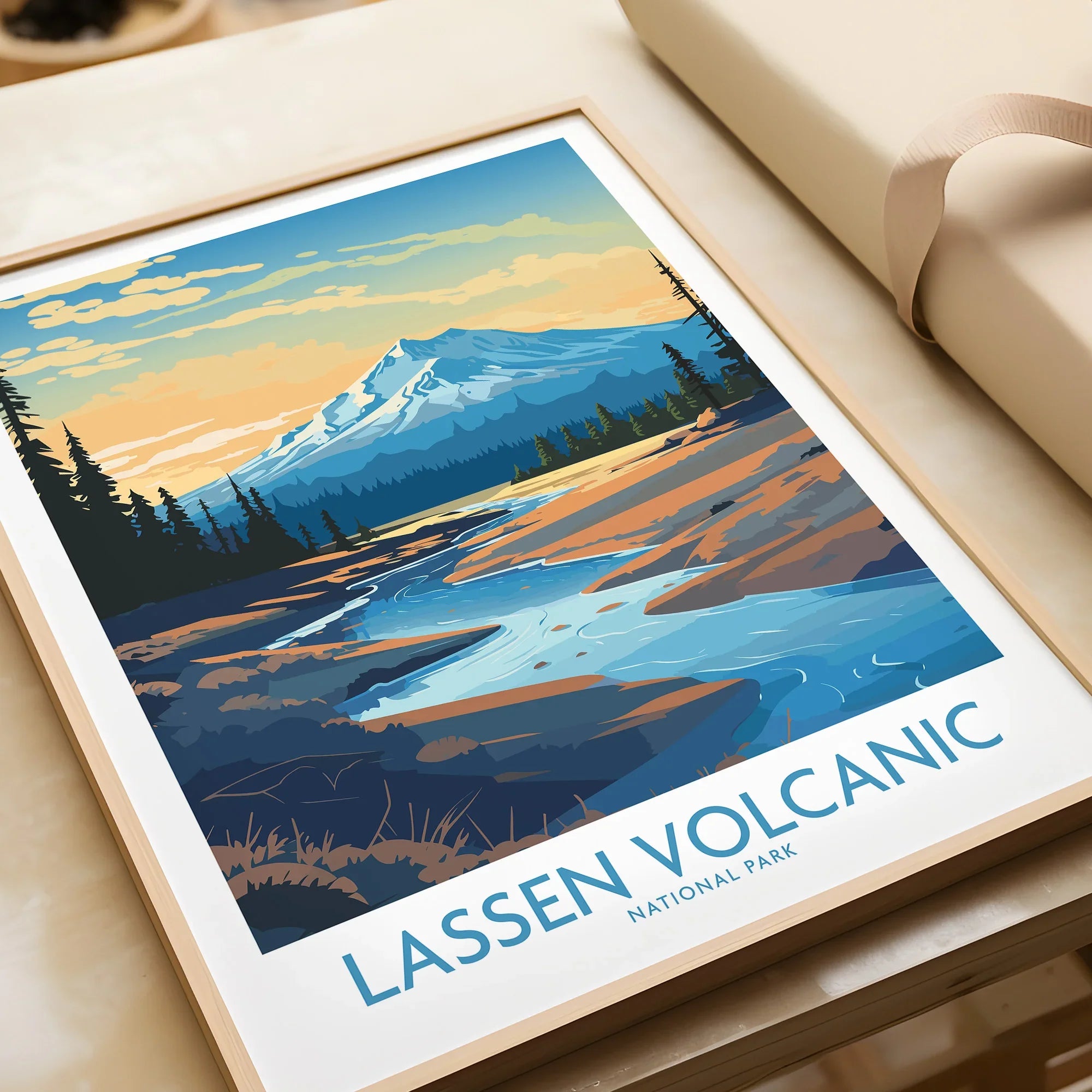 Framed Lassen Volcanic National Park art print with mountain landscape and river, unwrapped.