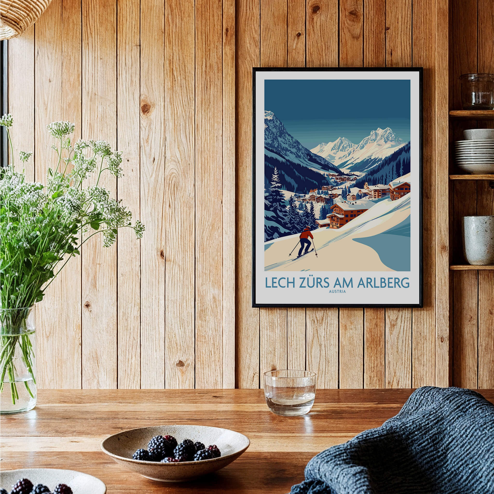 Lech Zürs am Arlberg Poster Austria displayed in a cozy wooden interior with flowers and dishes.