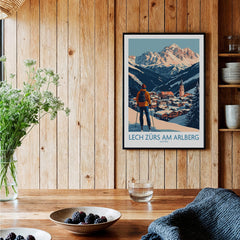 Ski Poster Lech Zürs am Arlberg Austria displayed in a cozy wooden interior with fresh flowers and fruit.