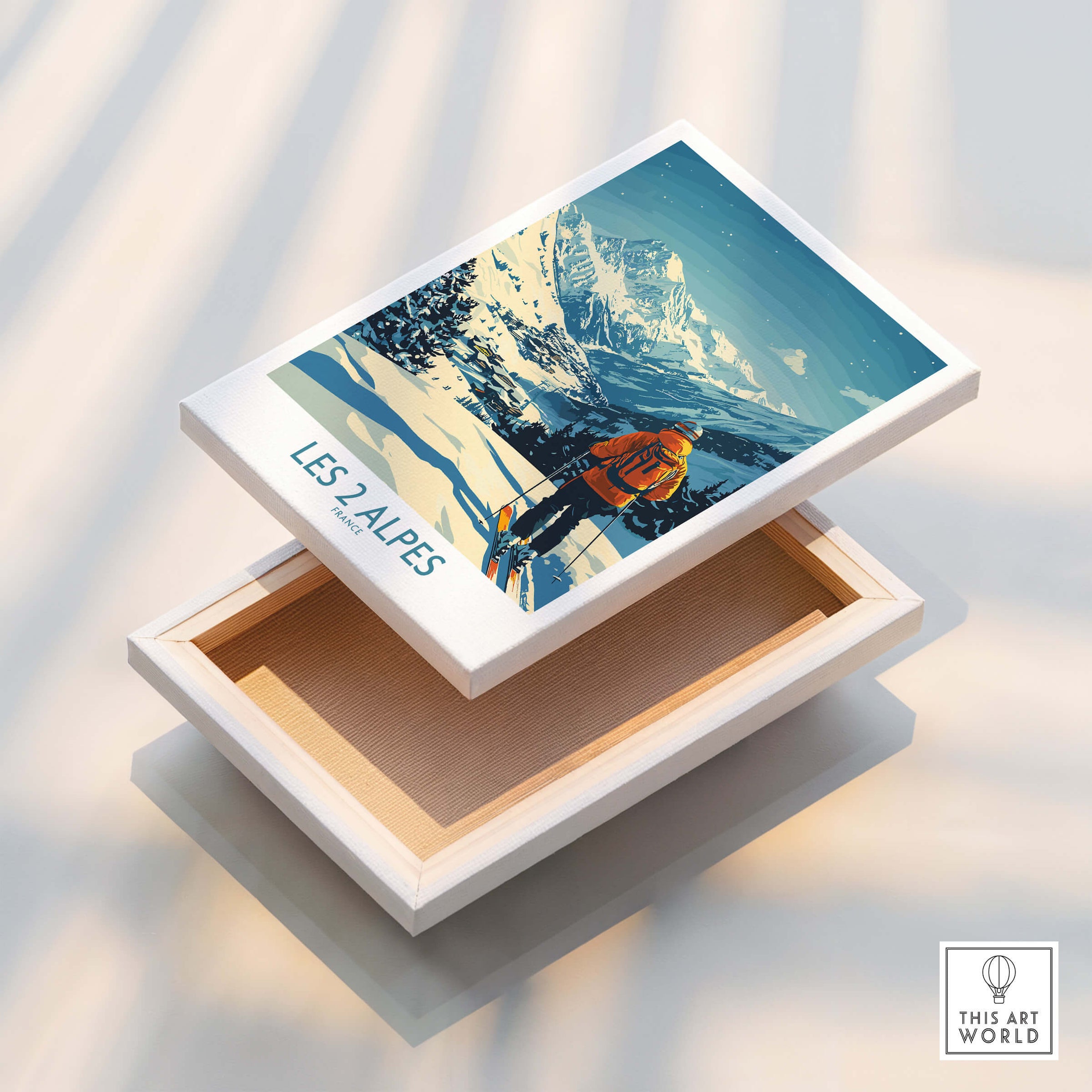 Les 2 Alpes Poster France displayed on a decorative box, showcasing stunning mountain views and ski resort vibes.
