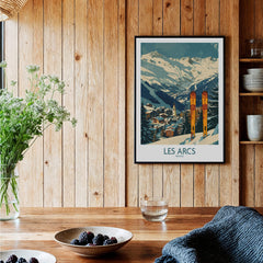 Les Arcs Wall Art - France showcasing vibrant ski poster in a cozy home setting with wooden decor.