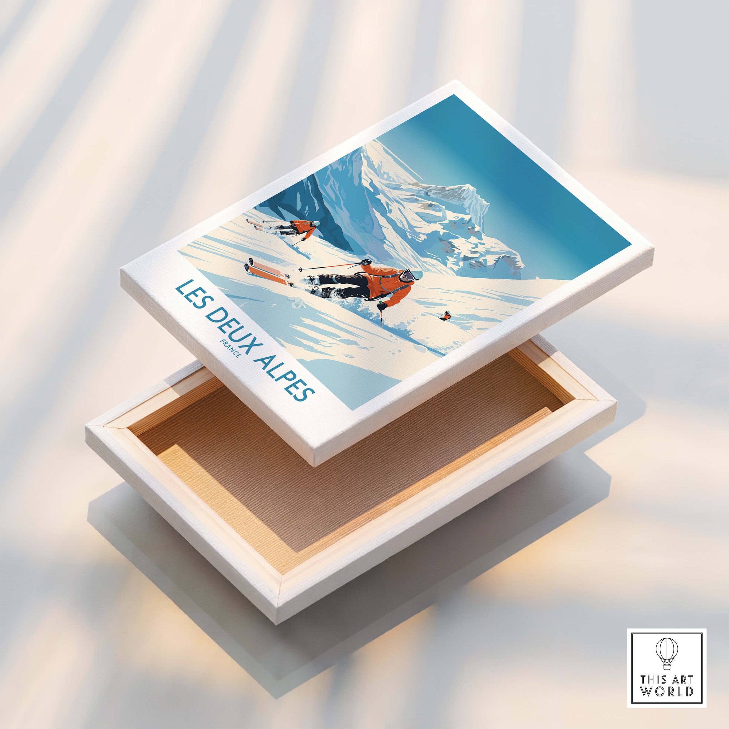 Les Deux Alpes Ski Print showcasing skiers against a stunning snowy mountain backdrop in a stylish presentation box.