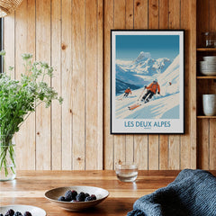 Les Deux Alpes Ski Print showcasing skiers on the slopes with alpine scenery in a cozy wooden home setting.