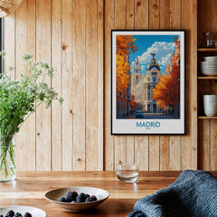 Madrid Wall Art Print displayed in a cozy interior with wooden walls and plants.