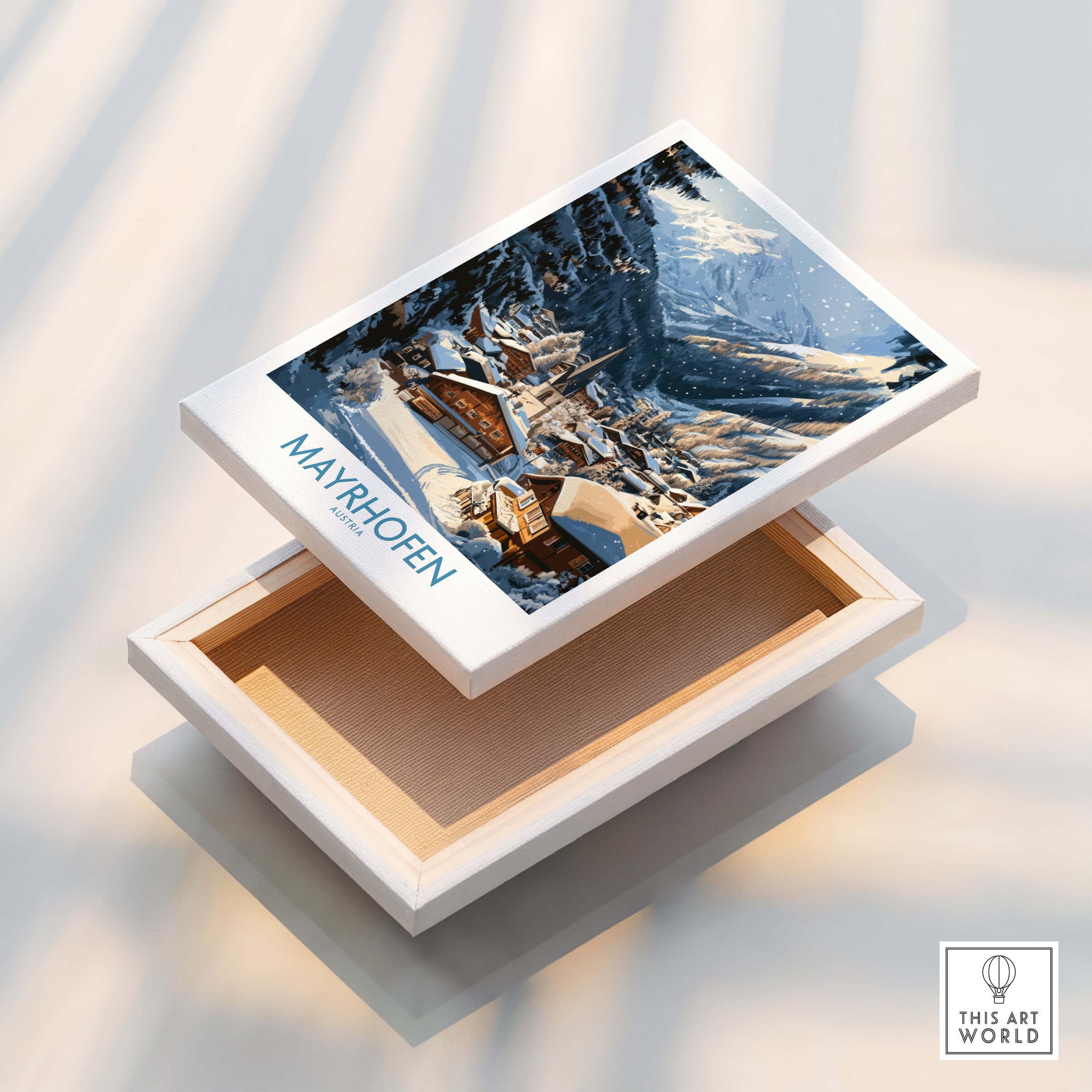 Mayrhofen Ski Wall Art Poster displayed on a decorative box, showcasing the beauty of the Austrian Alps.