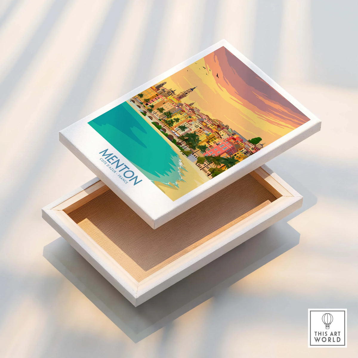 Menton Cote d'Azur Poster Print displayed on a wooden box, showcasing the vibrant colors of the French Riviera.