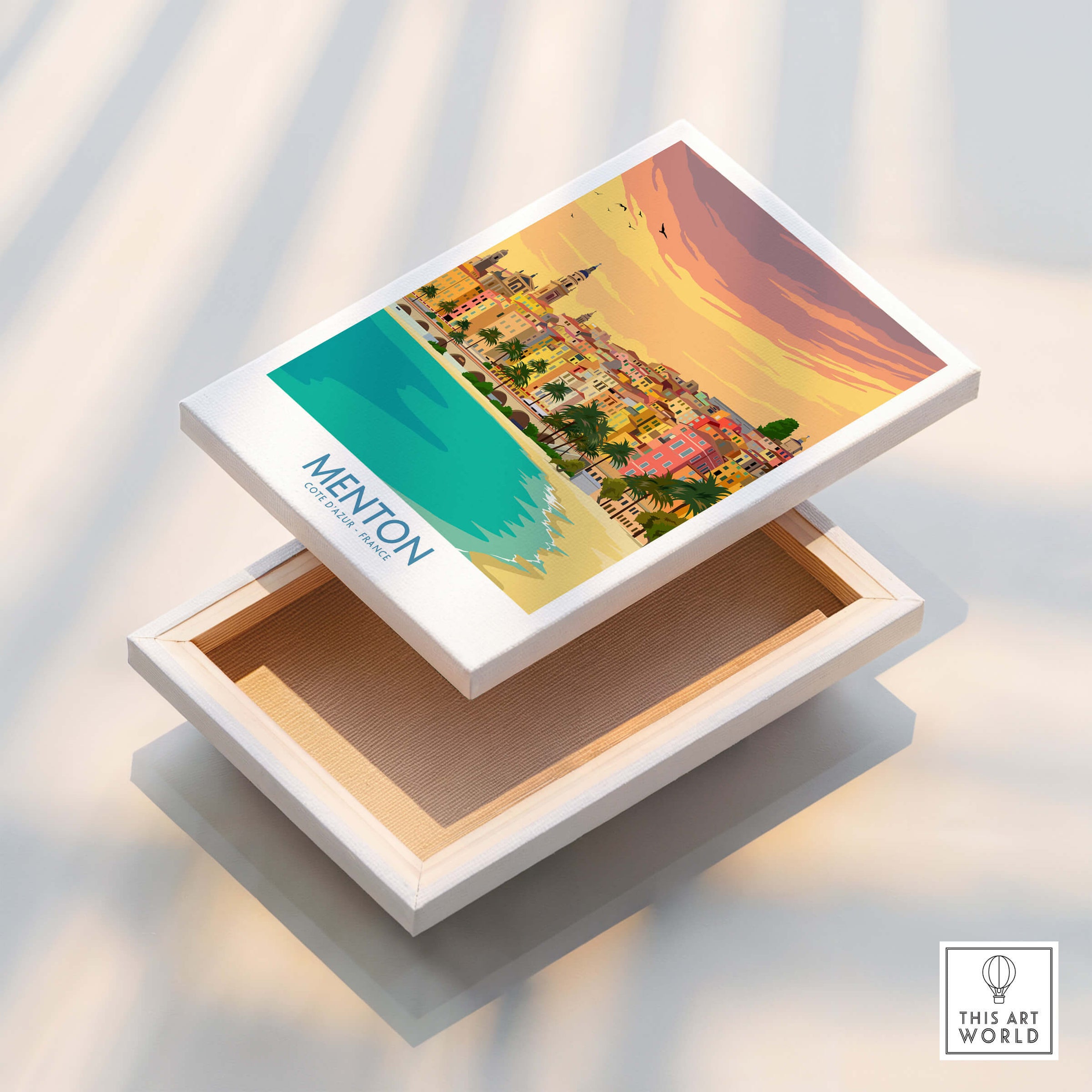 Menton Cote d'Azur Poster Print displayed on a wooden box, showcasing the vibrant colors of the French Riviera.