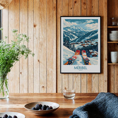 Meribel Wall Art Ski Print -  France displayed in a cozy interior with wooden decor and tableware.