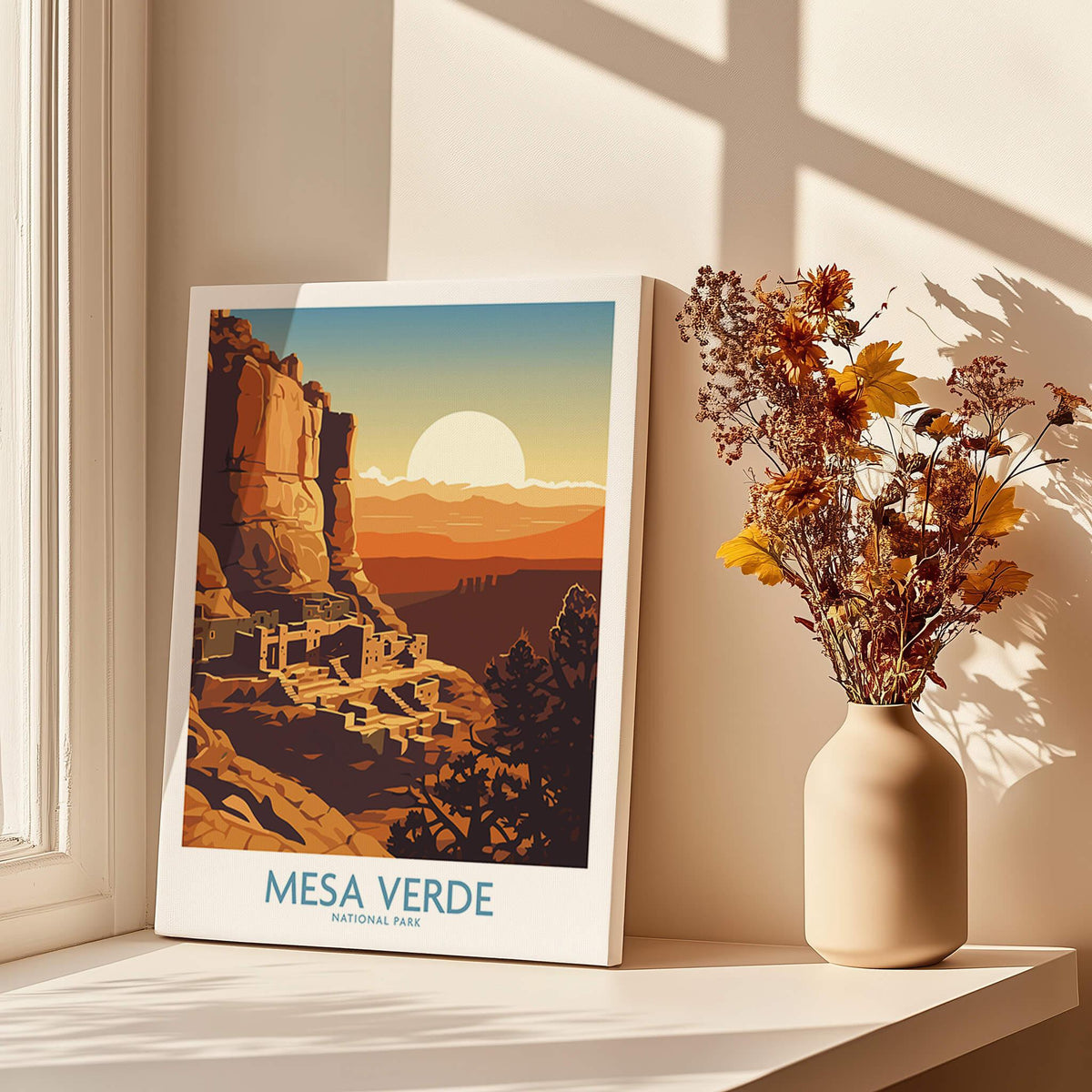 Mesa Verde National Park art print with sunset, displayed by window with vase of dried flowers.