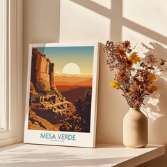Mesa Verde National Park art print with sunset, displayed by window with vase of dried flowers.