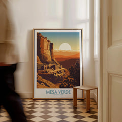 Framed Mesa Verde National Park travel poster with sunset colors resting on a checkered floor.