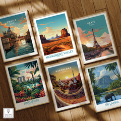 Set of six framed travel posters featuring Venice, Monument Valley, Paris, Singapore, Barcelona, and Sri Lanka displayed on a wooden floor.