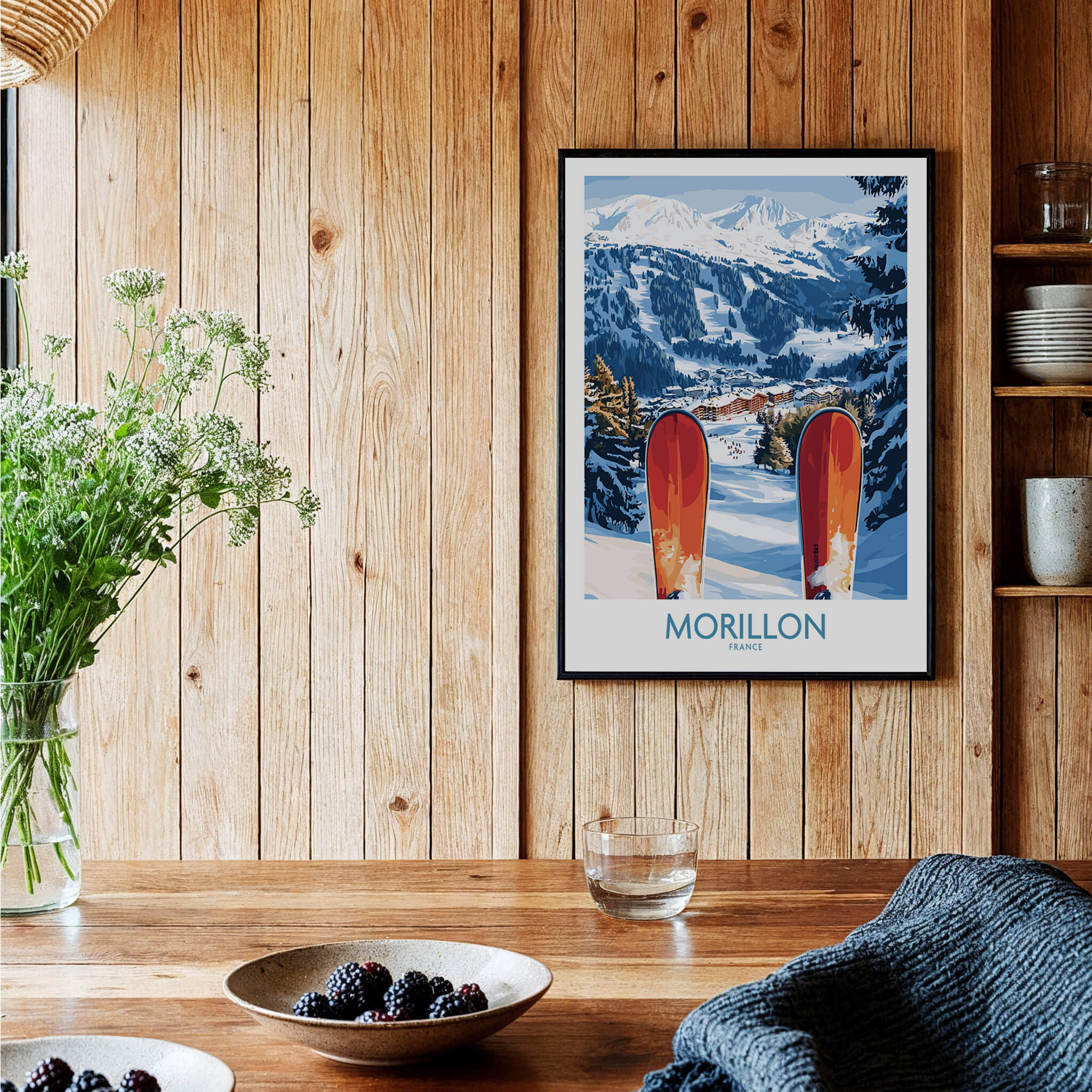 Ski Poster Morillon France featuring picturesque snowy slopes and vibrant red skis framed on a wooden wall.