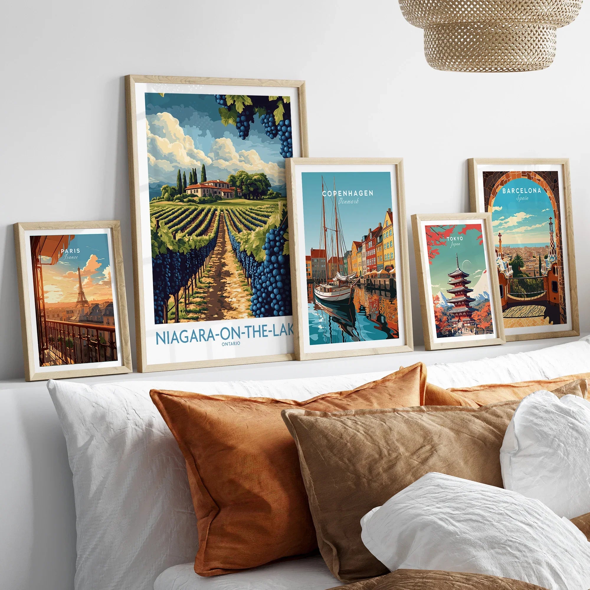 Framed travel posters of Paris, Niagara-on-the-Lake, Copenhagen, Tokyo, and Barcelona for wall art decor