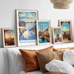 Framed travel posters of Paris, Niagara-on-the-Lake, Copenhagen, Tokyo, and Barcelona for wall art decor