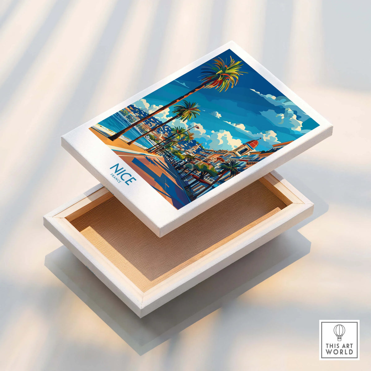 Nice Travel Poster - France displayed on a decorative box, showcasing vibrant colors and French coastal scenery.