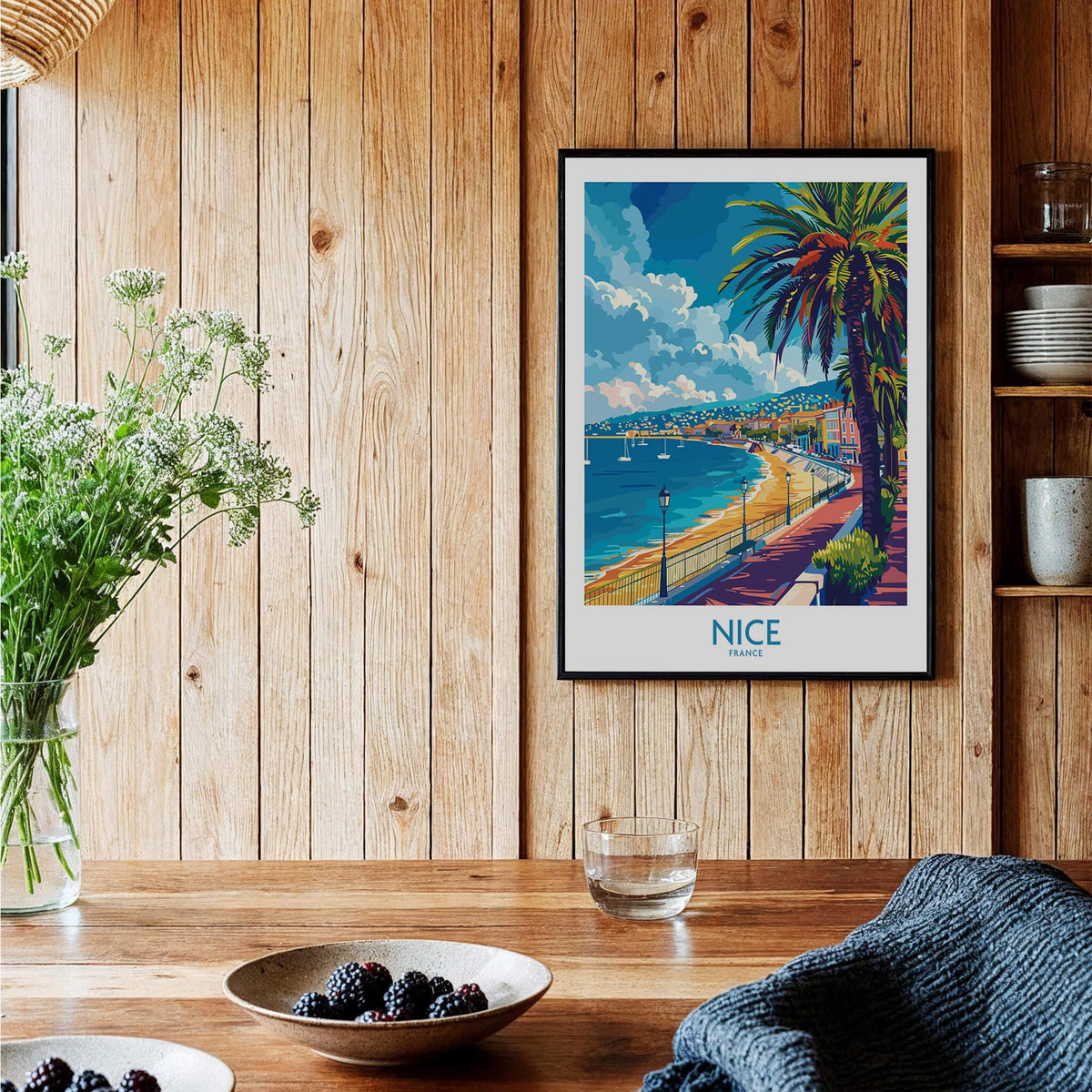 Nice Poster - French Riviera showcasing the vibrant beach scene and palm trees in a cozy interior setting.