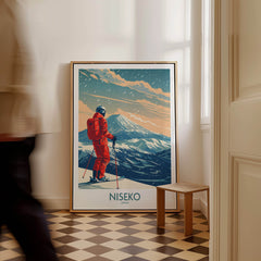 Niseko Ski Print - Japan featuring a skier against a backdrop of beautiful mountains in a stylish room.