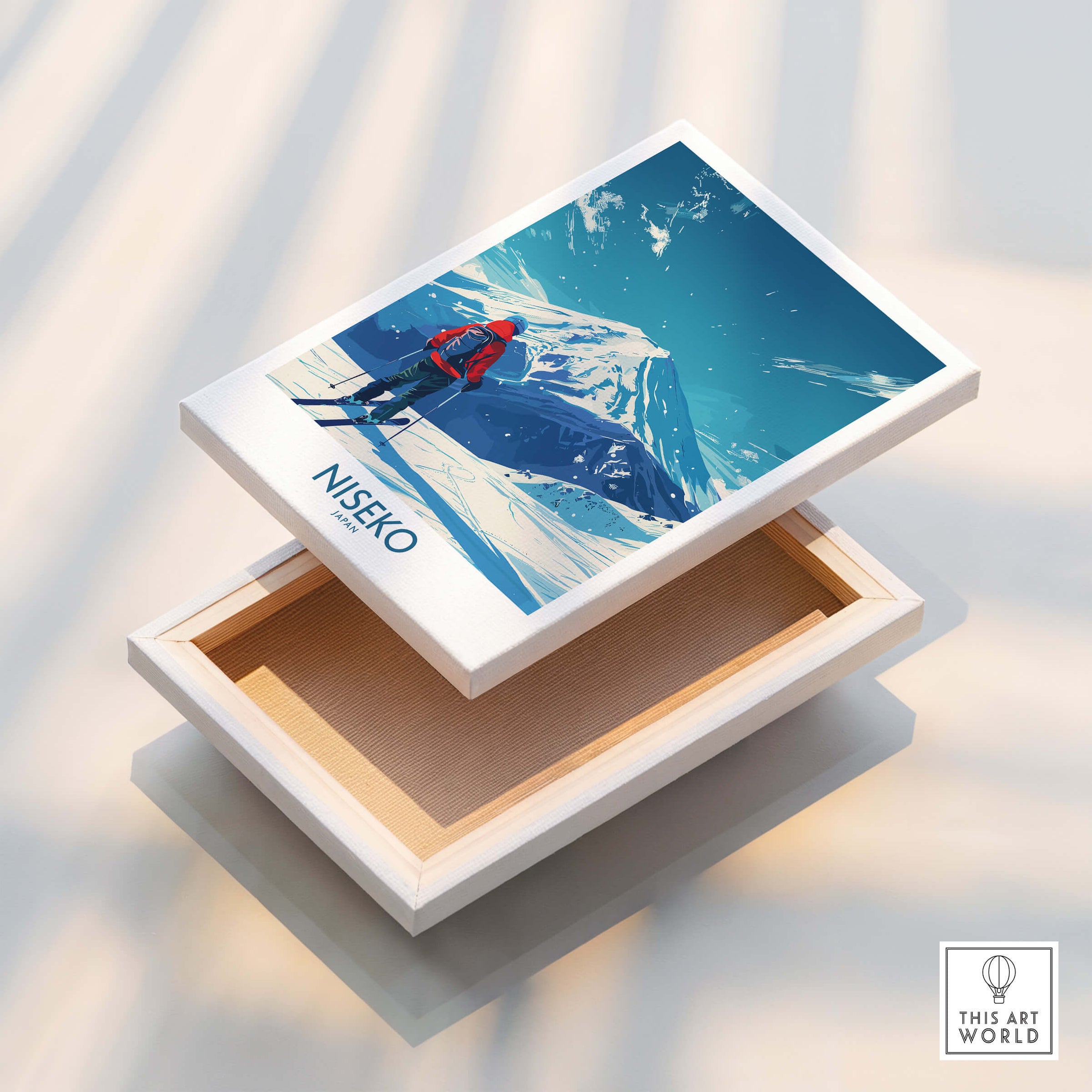 Niseko Ski Poster - Japan showcased on a wooden box with a scenic winter mountain backdrop.