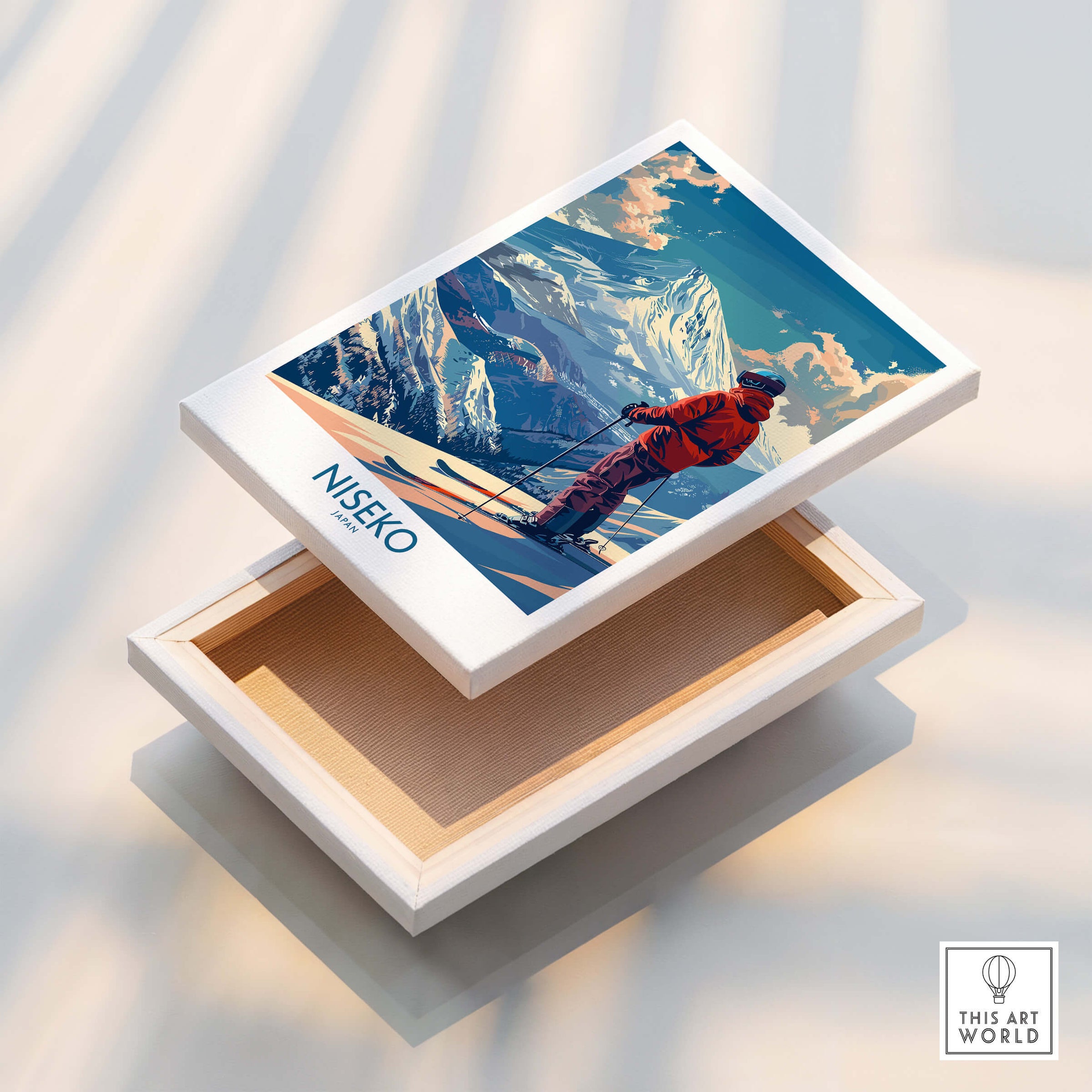 Niseko Wall Art Print - Ski Poster Japan displayed on a wooden box, showcasing a vibrant ski scene in Japan.