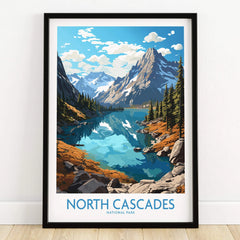 North Cascades National Park art print with lake, mountains, and pine trees in black frame on floor