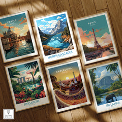 Set of six framed travel posters including Venice, North Cascades, Paris, Singapore, Barcelona, and Sri Lanka on wooden floor.
