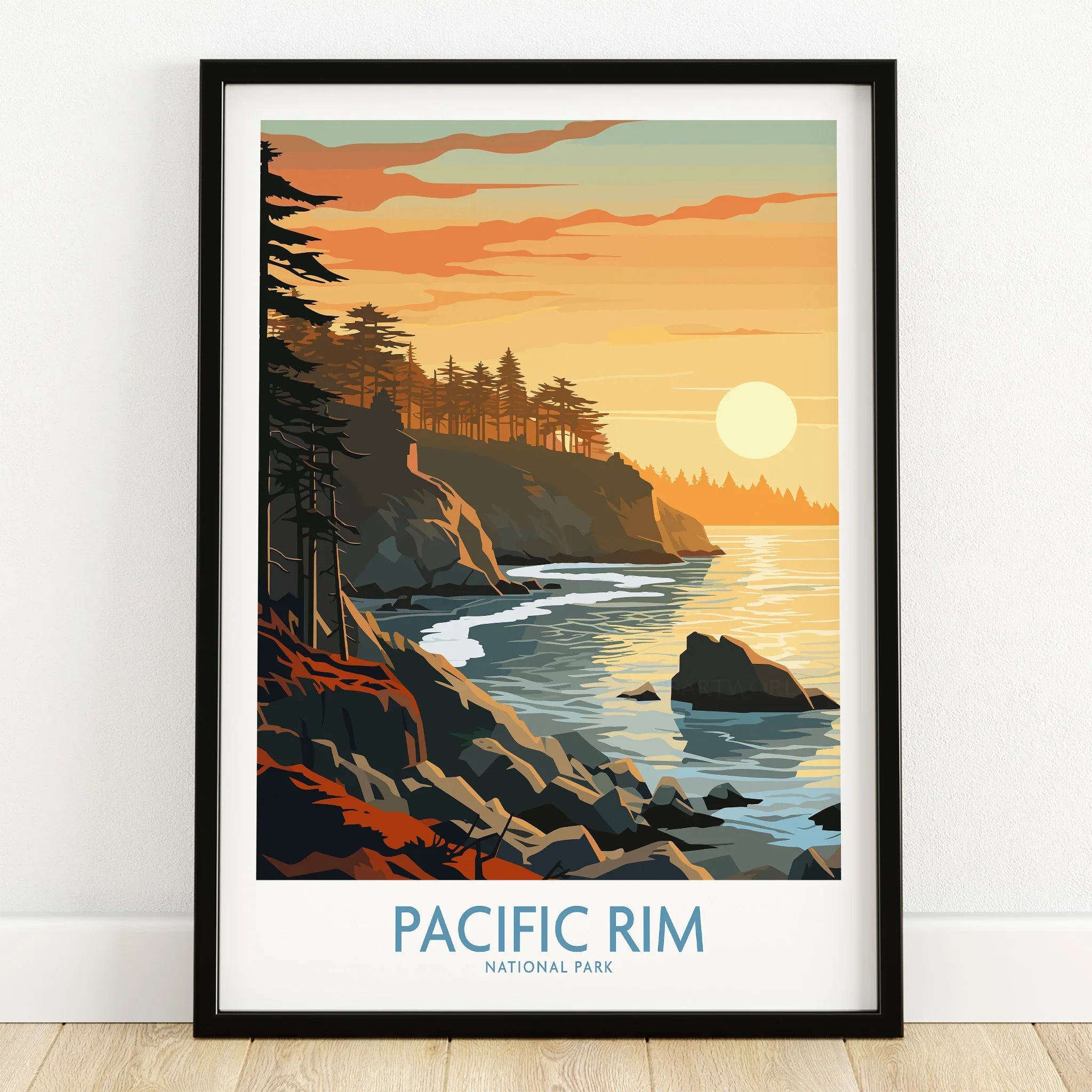 Pacific Rim National Park art print in black frame, coastal sunset landscape, on wooden floor