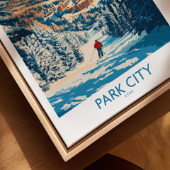 Park City Print Utah Skiing showcased in a framed artwork, featuring a skier on a snowy slope.
