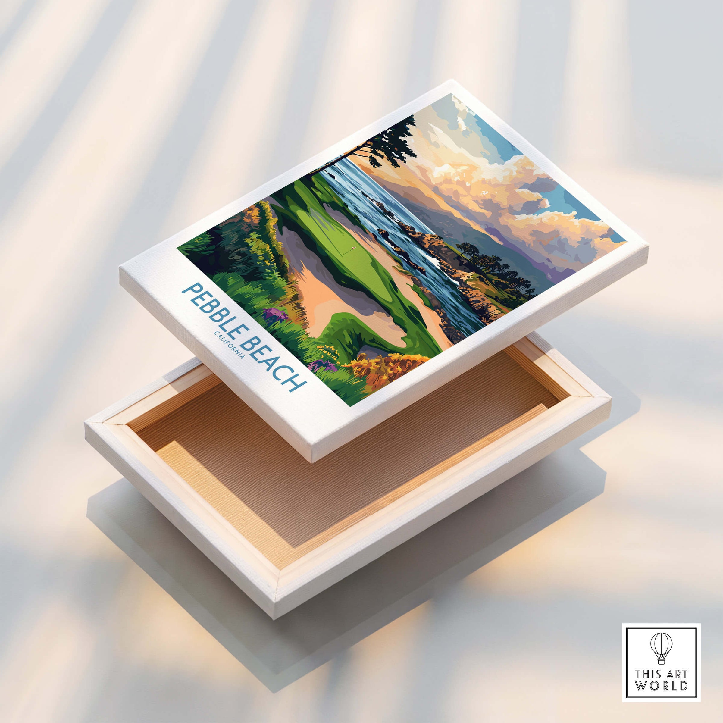 Pebble Beach Print California - Iconic Golf Poster displayed on a decorative box, showcasing a beautiful golf course scene.