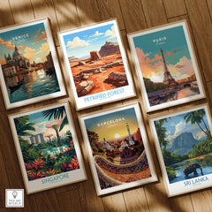 Set of six framed travel posters of Venice, Paris, Petrified Forest, Singapore, Barcelona, and Sri Lanka on wooden floor.