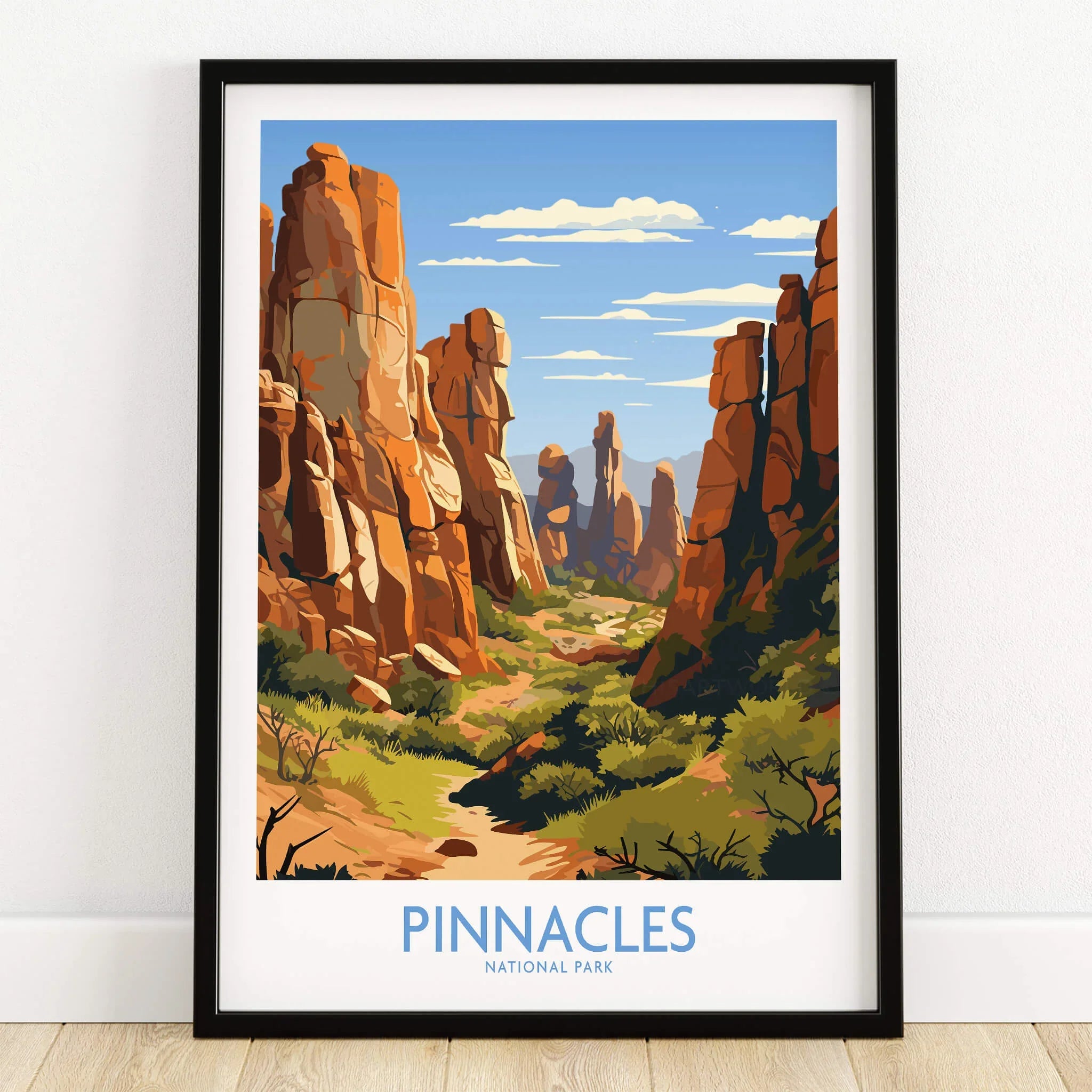 Pinnacles National Park art print in black frame on wooden floor, landscape wall decor.