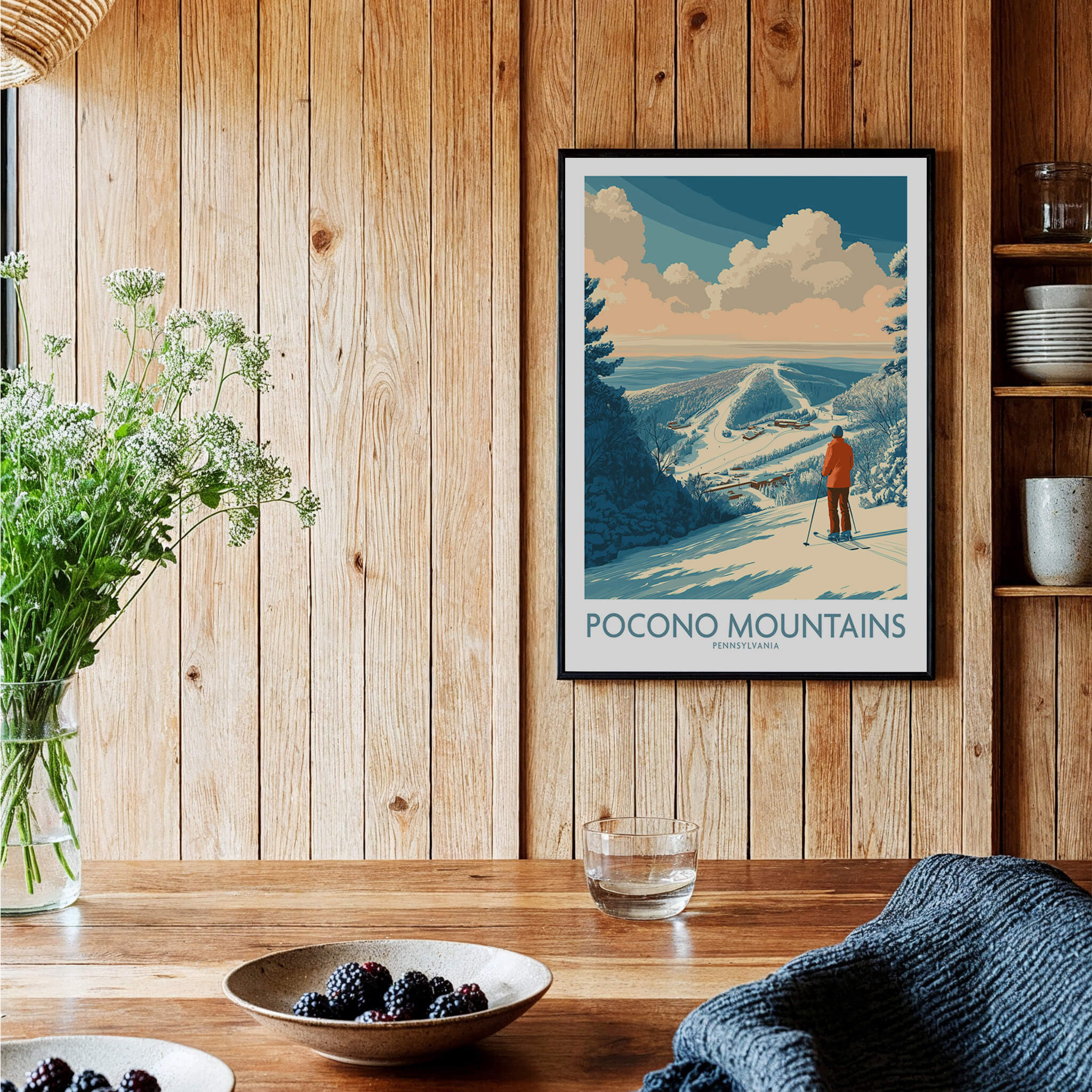 Pocono Mountains Pennsylvania ski poster hanging on wood wall in rustic dining room