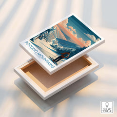Pocono Mountains travel poster art on canvas box featuring snowy ski landscape and skier.