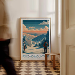 Framed Pocono Mountains ski travel poster with skier and snowy landscape in modern hallway