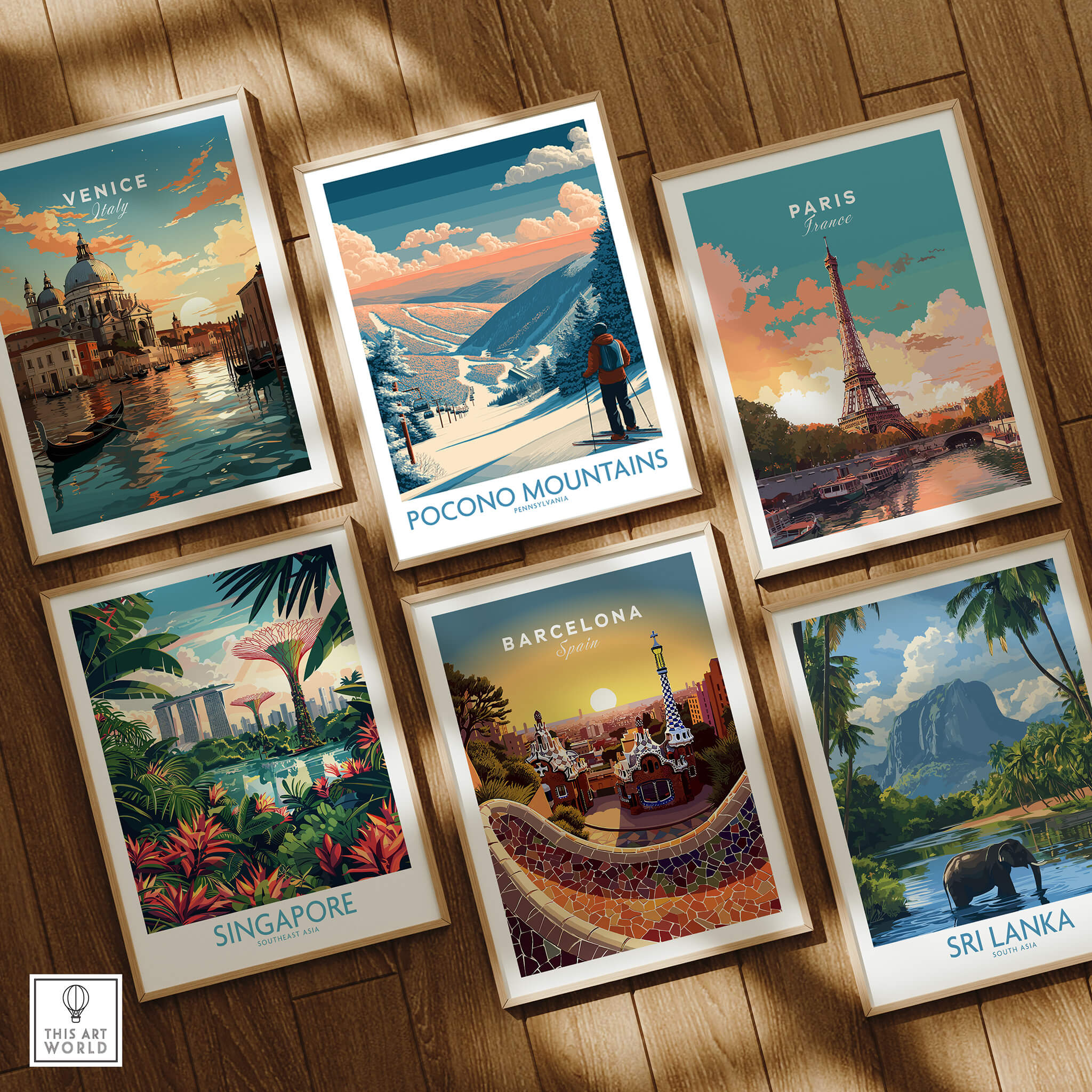 Framed travel posters of Venice, Pocono Mountains, Paris, Singapore, Barcelona, and Sri Lanka on wood floor