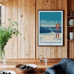 Pocono Mountains travel poster wall art with skis in a cozy rustic kitchen setting